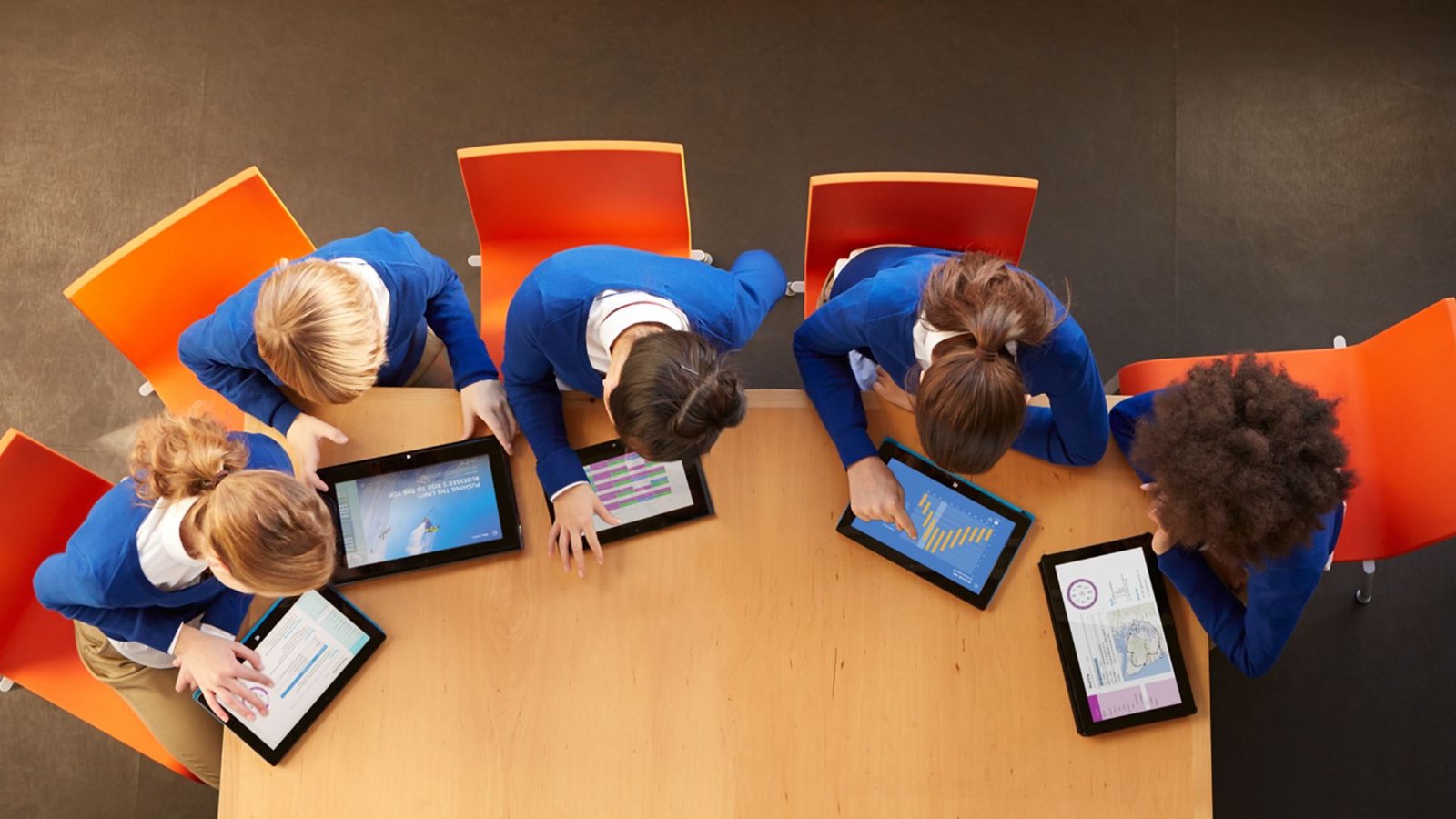 A Group of Students Using Tablets